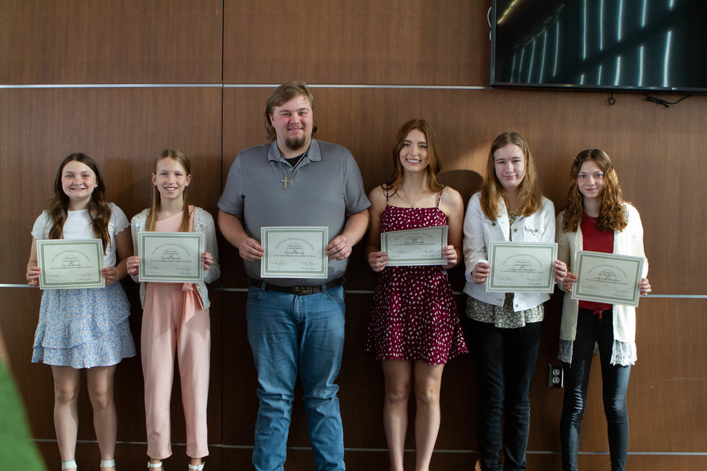 6 students with certificates